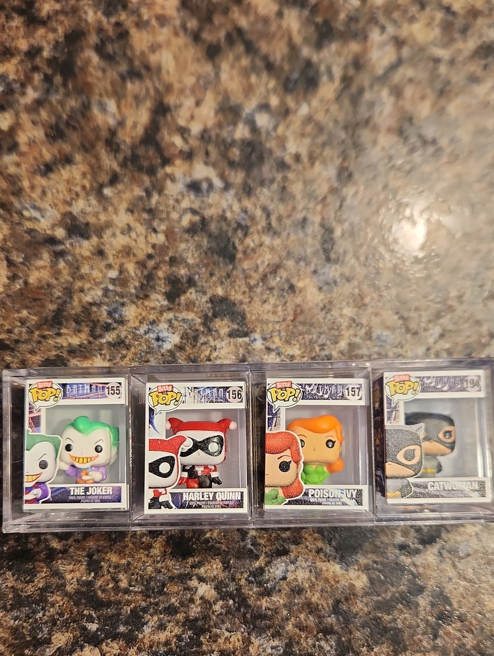 EUC Funko Set Of 4 Bitty Pop! Catwoman, Poison Ivy, Harley Quinn & The Joker